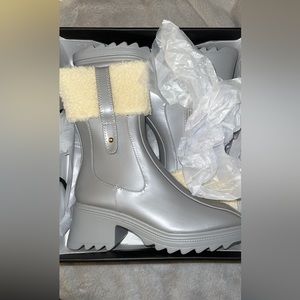 Grey Boots size 7.5 in womens with furry detail and side zipper